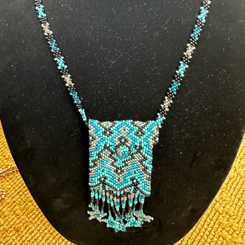 Handcrafted seed bead pouch necklace